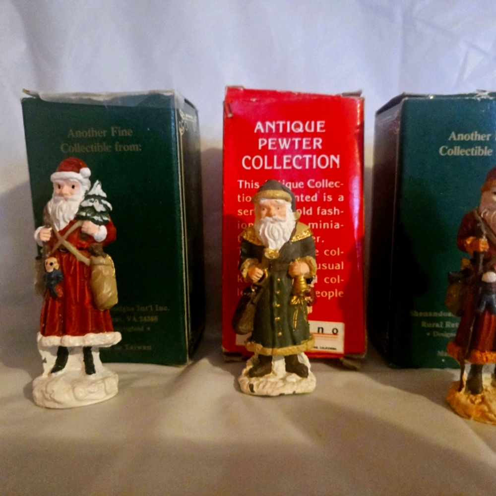 Miniature collection three pewter santas